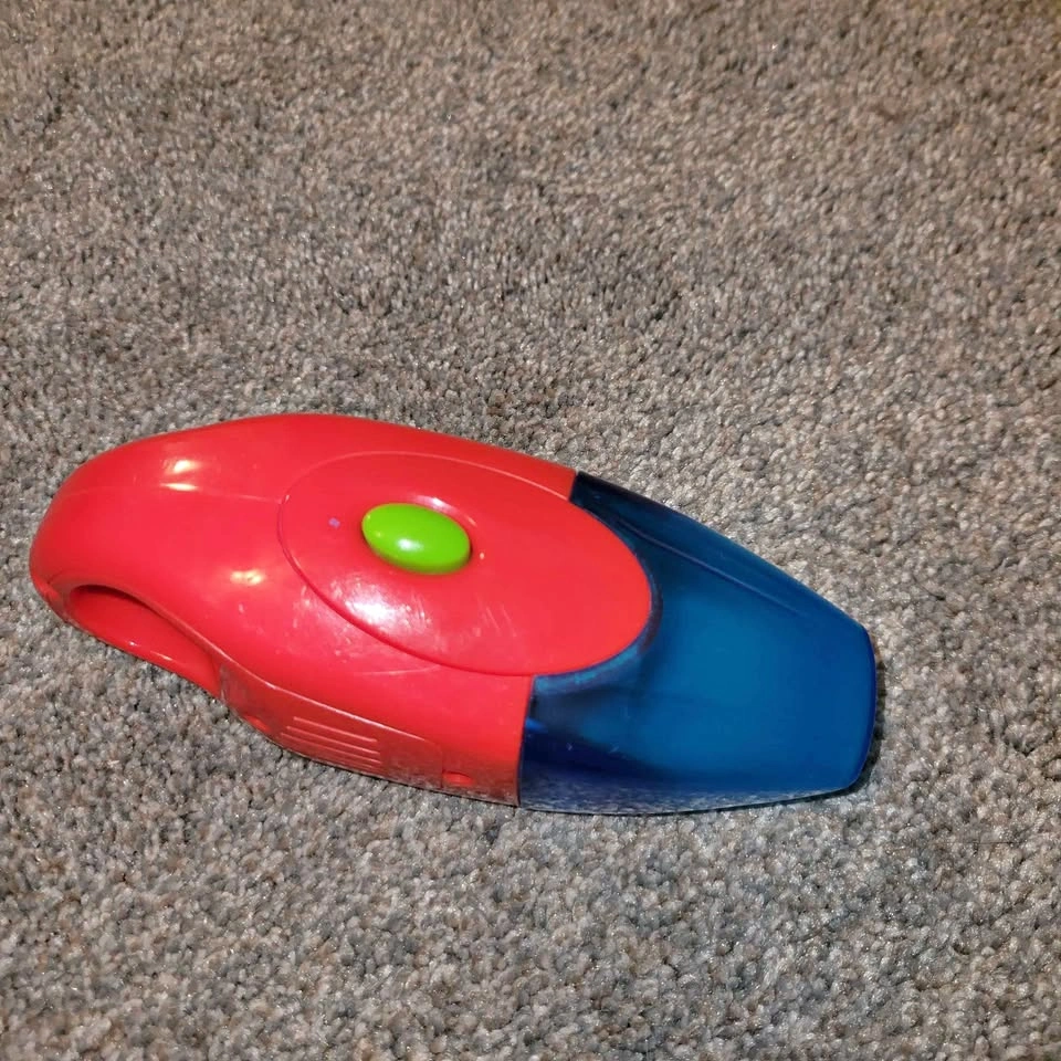 Toy hand held vacuum