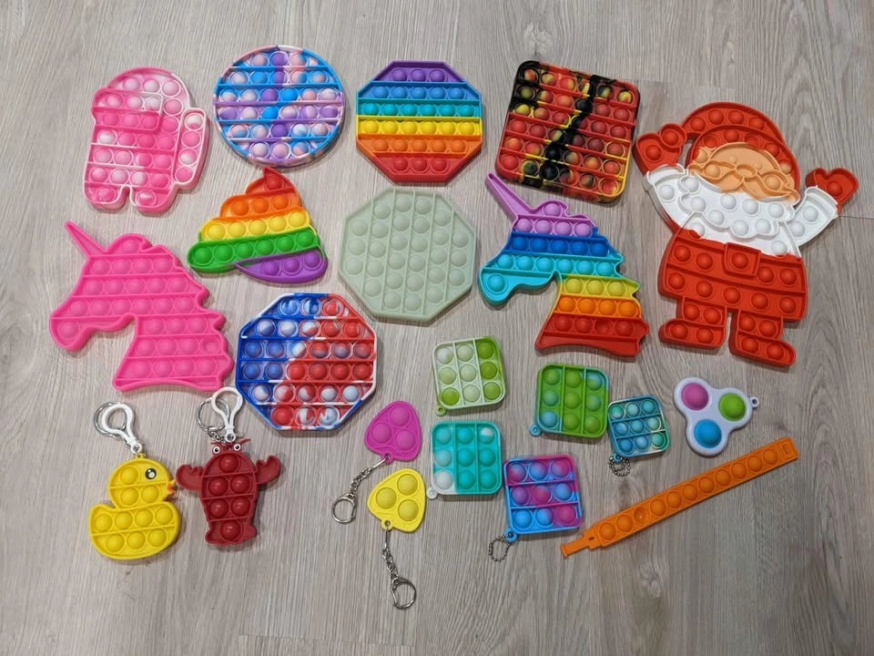 Huge Pack of Pop Its & Sensory Fidget Toys - photo 2