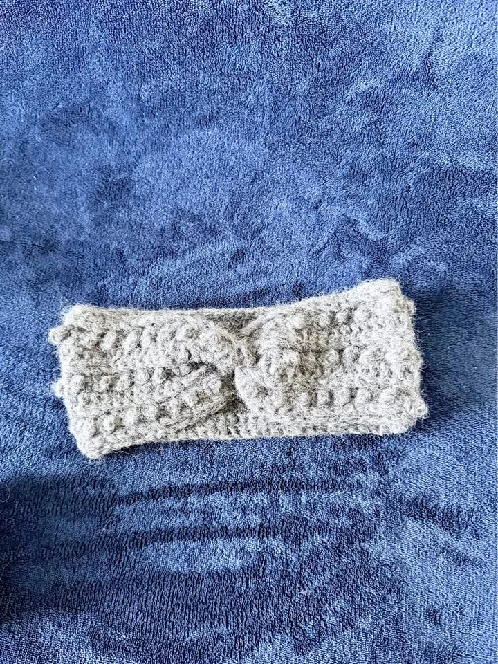 Gray knitted twisted headband ear warmer