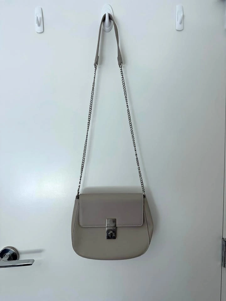 Le Chateau Light Grey Crossbody Bag