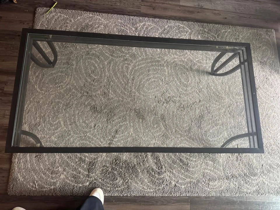 Glass top coffee table with black metal base - photo 2