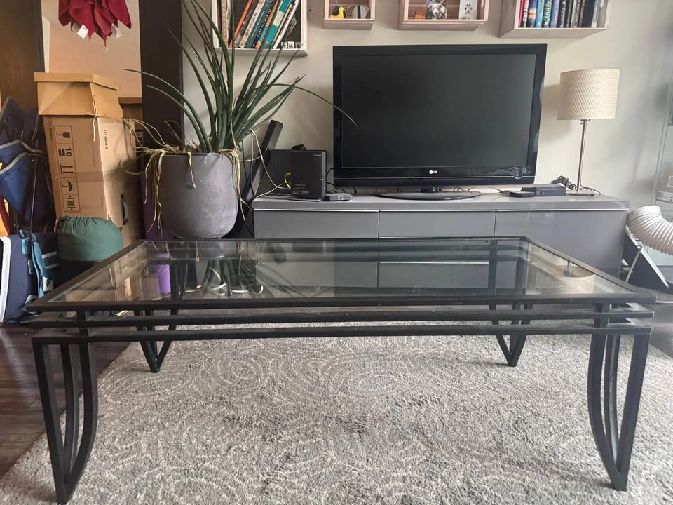Glass top coffee table with black metal base - photo 3