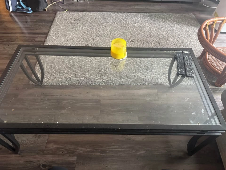 Glass top coffee table with black metal base - photo 4