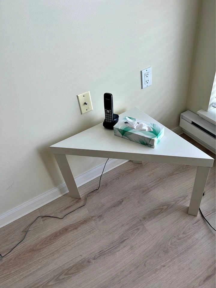 White triangular table