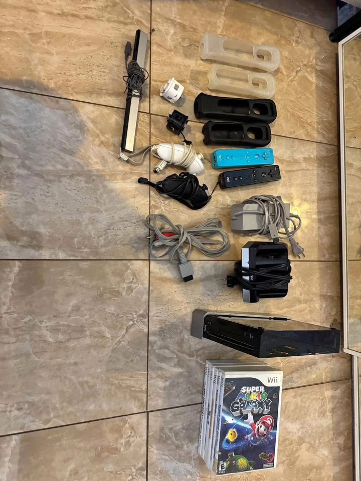 Nintendo Wii + Accessories and Games