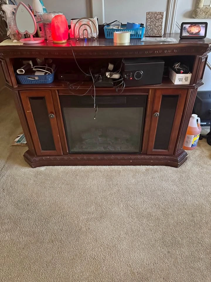 Mahogany/Cherry Electric Fireplace Console ( price negotiable)