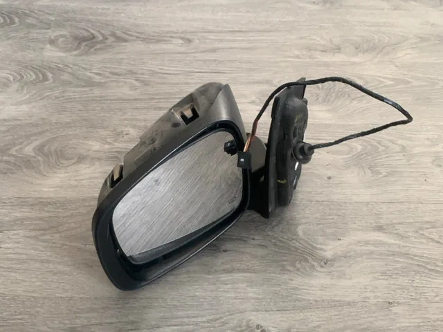 Driver Sideview Mirror for Dodge Caravan thumbnail