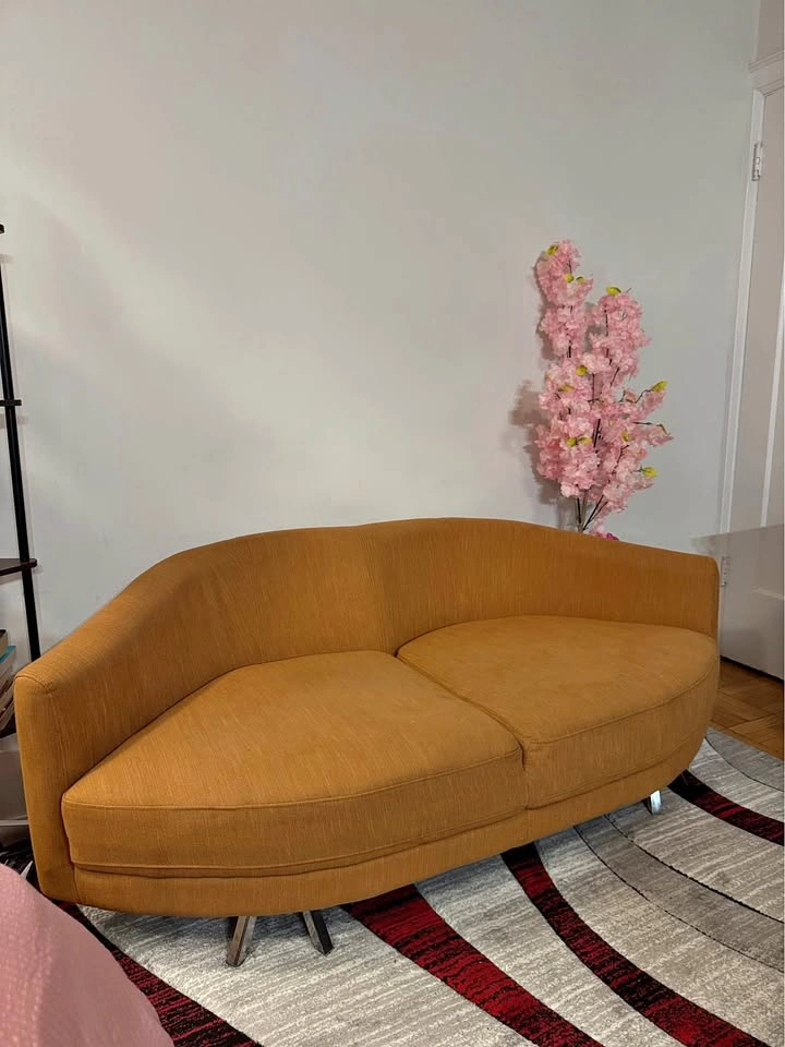 Move out sale - Lip shaped orange couch