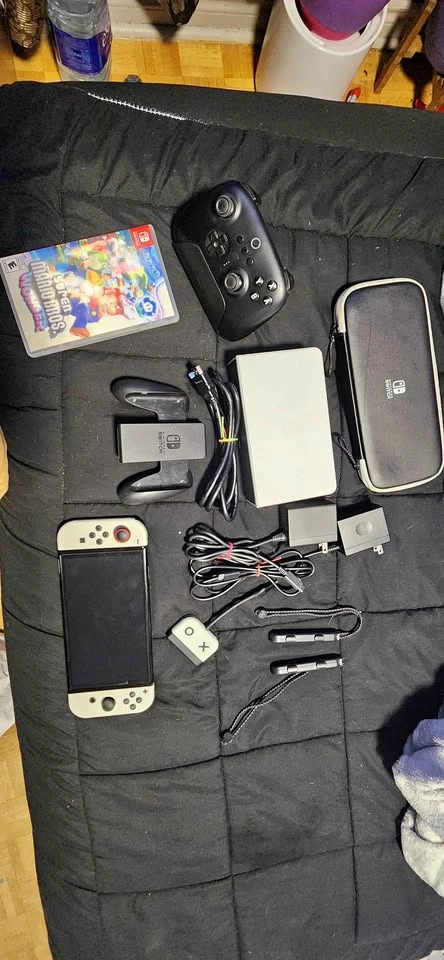 Nintendo Switch OLED Bundle w/ Pro Controller + Mario Wonder