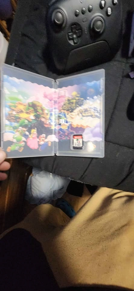 Nintendo Switch OLED Bundle w/ Pro Controller + Mario Wonder - photo 3