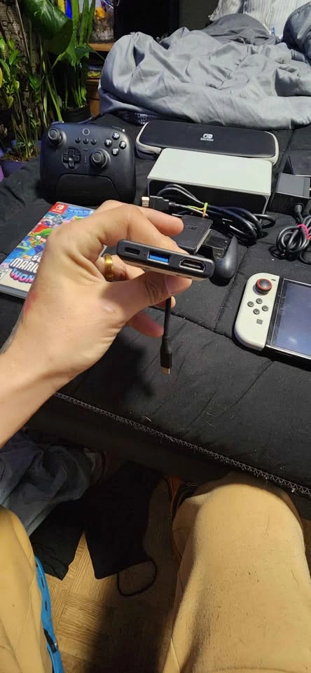 Nintendo Switch OLED Bundle w/ Pro Controller + Mario Wonder - photo 4