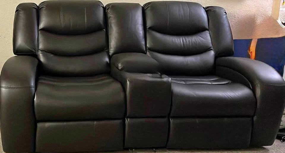 Two seater power recliner leather sofa