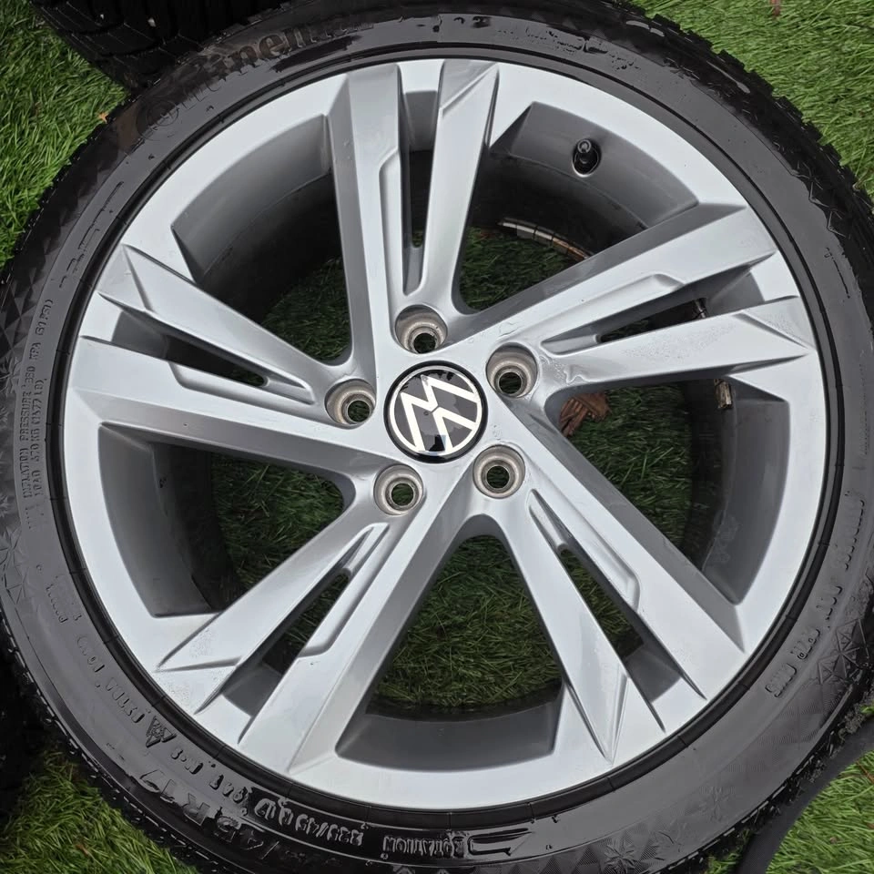225/45/17 Continental Winter Tires w/ VW OEM Rims - photo 3