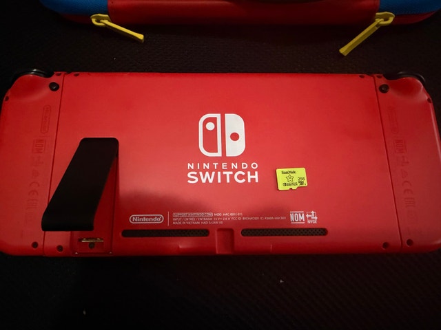 Nintendo Switch MARIO RED and BLUE EDITION - photo 2