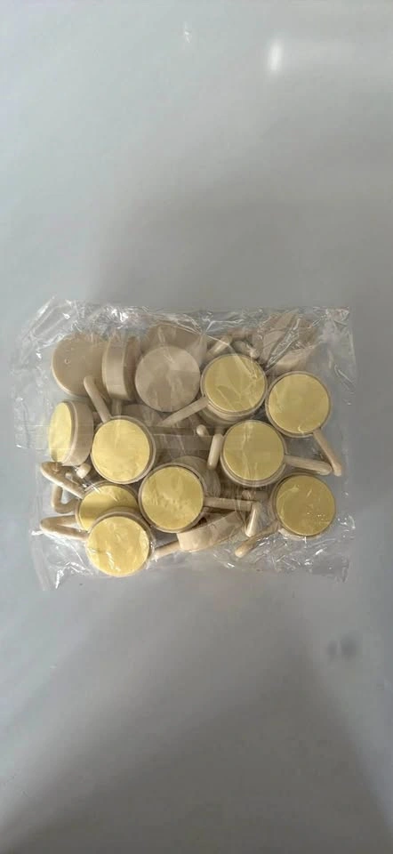 New pack of adhesive wall hooks
