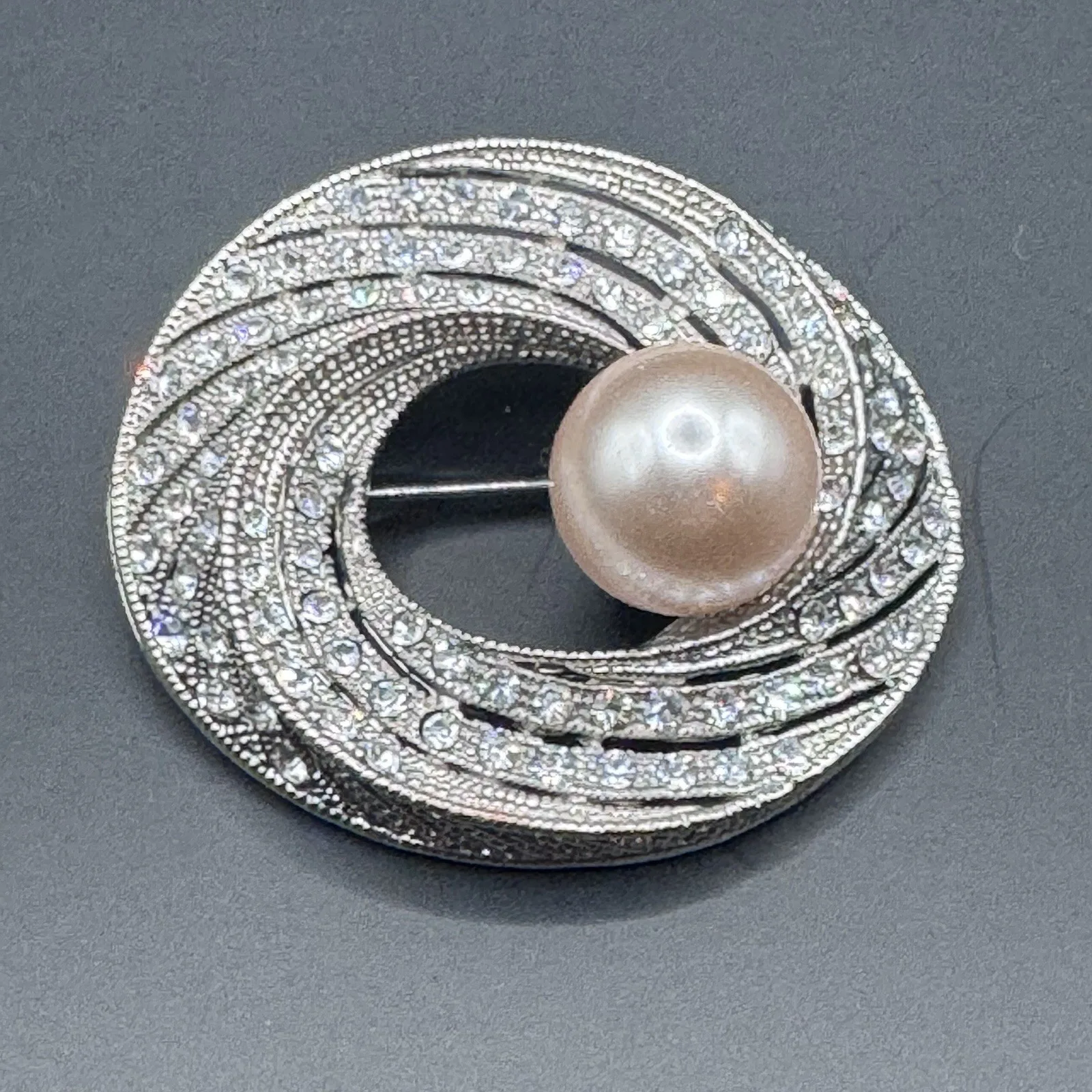 Vintage pot metal, rhinestone and faux pearl brooch