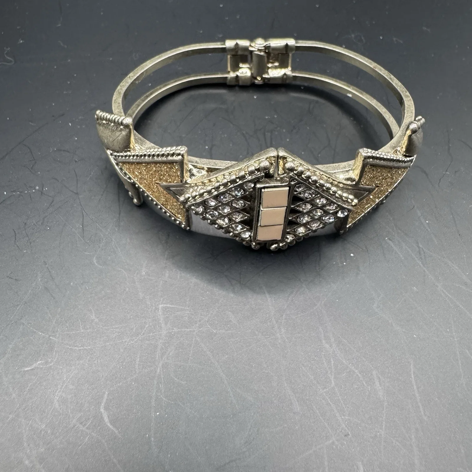 Large hinge clasp Deco- Inspired bracelet with gold tone and rhi