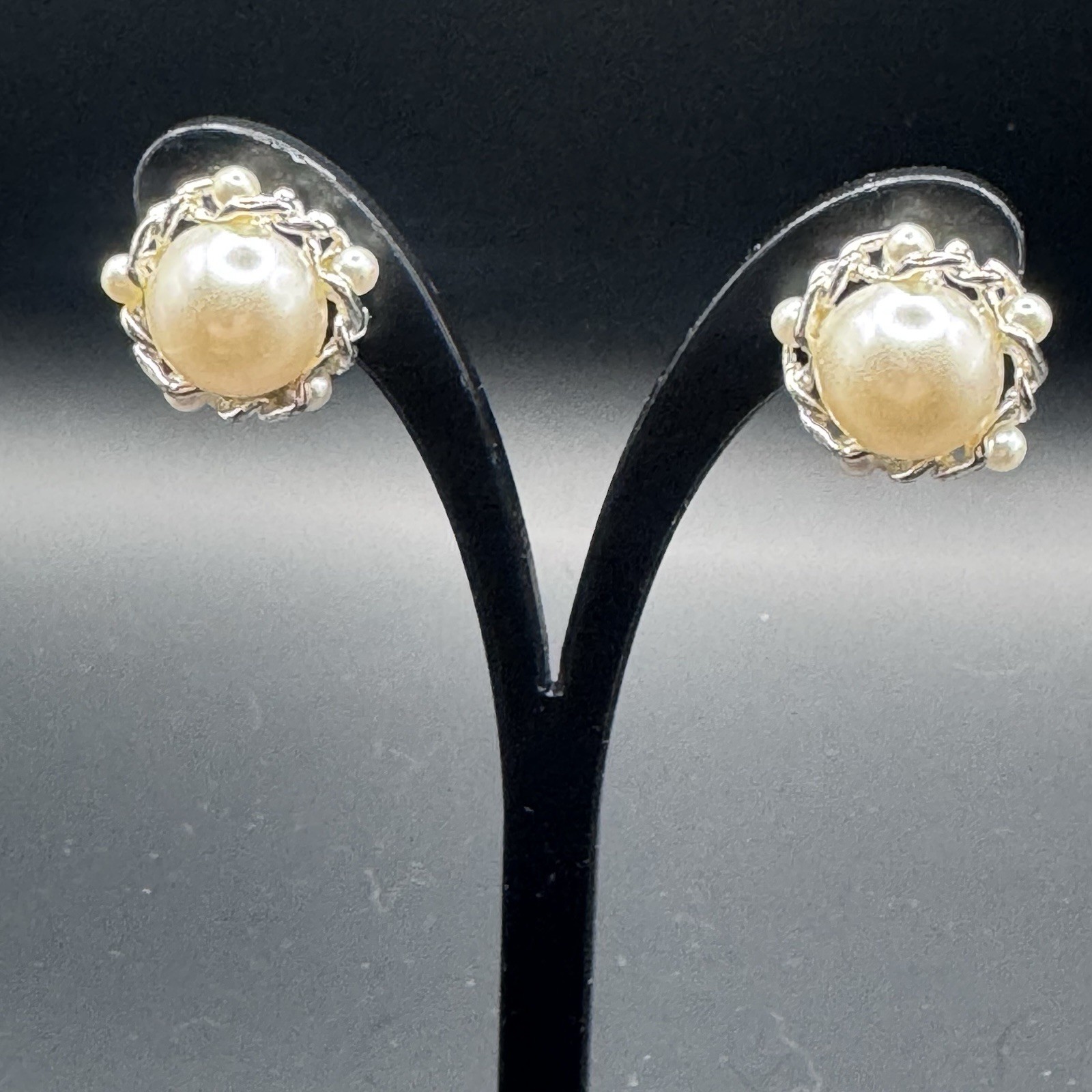 Small, round, faux pearl and silver toned clip on earrings - photo 4