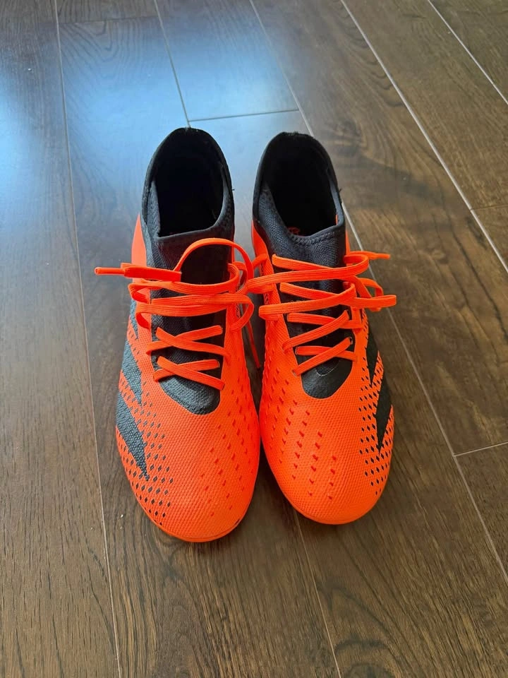 PREDATOR ACCURACY.3 FIRM GROUND SOCCER CLEATS