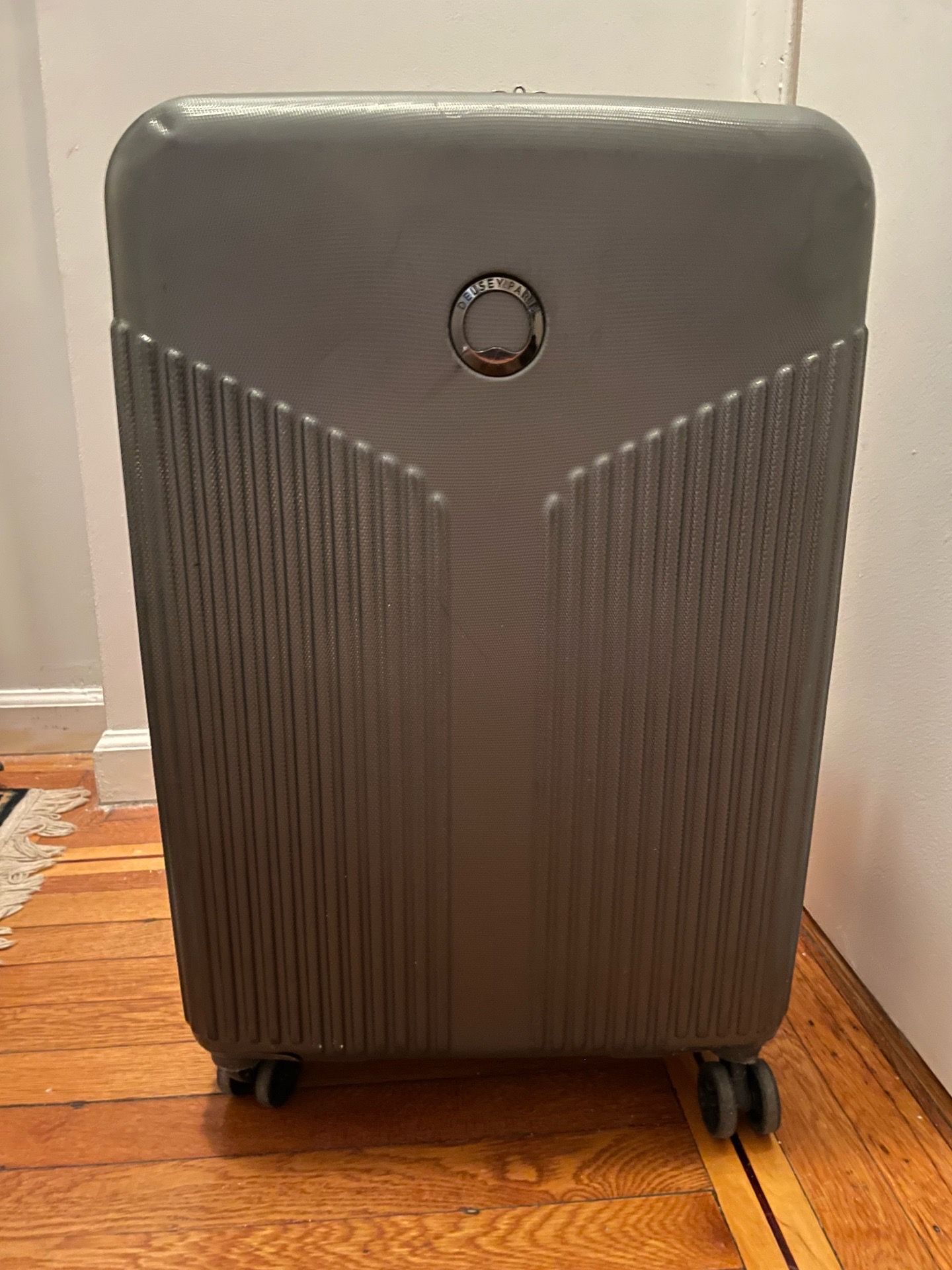 Used Delsey medium luggage