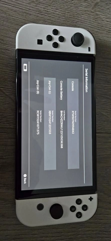 Nintendo Switch OLED w/ Mario Wonder & Case - photo 2