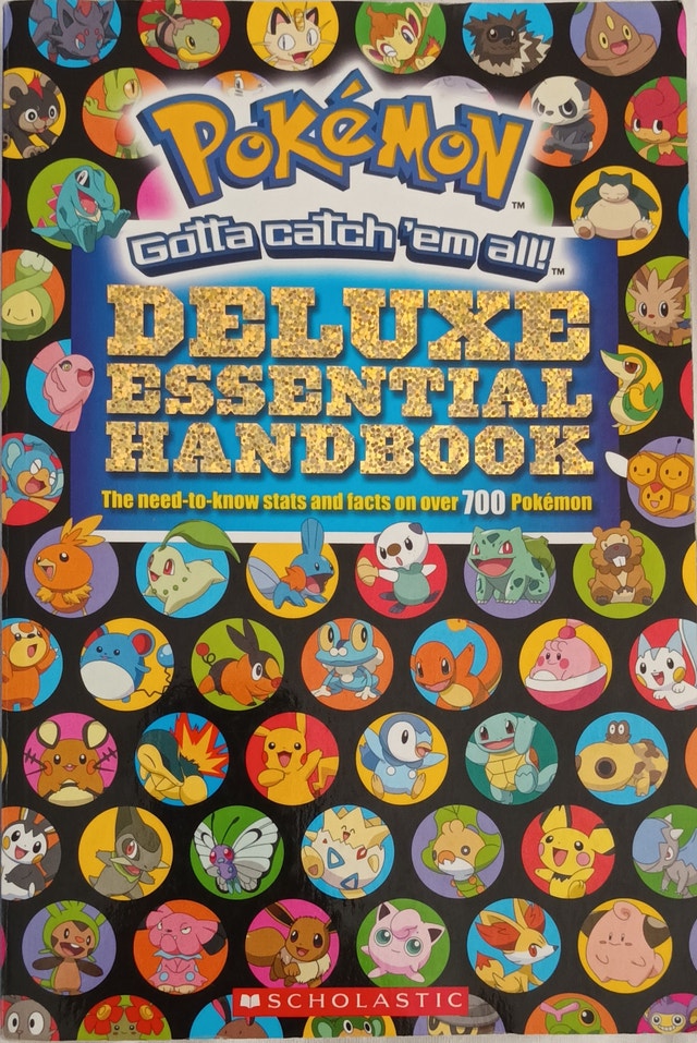Pokemon Deluxe Essential Handbook Scholastic 2015