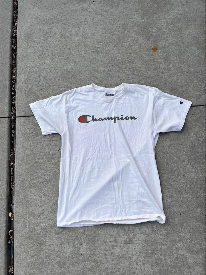 Champion Tee