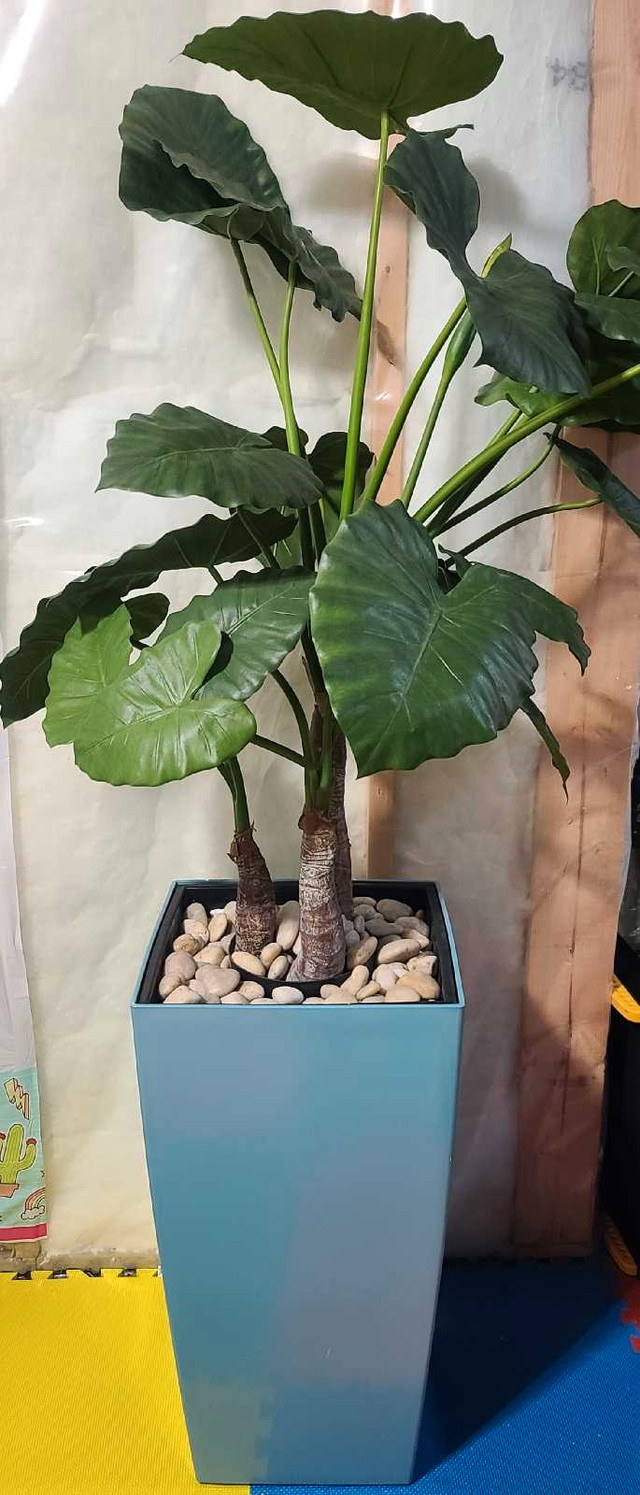 Fake plant and tall pot