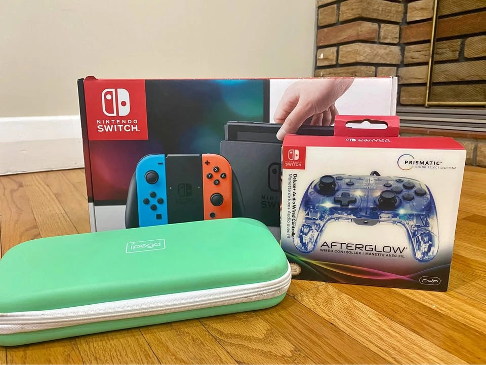 NINTENDO SWITCH BUNDLE + EXTRA CONTROLLER