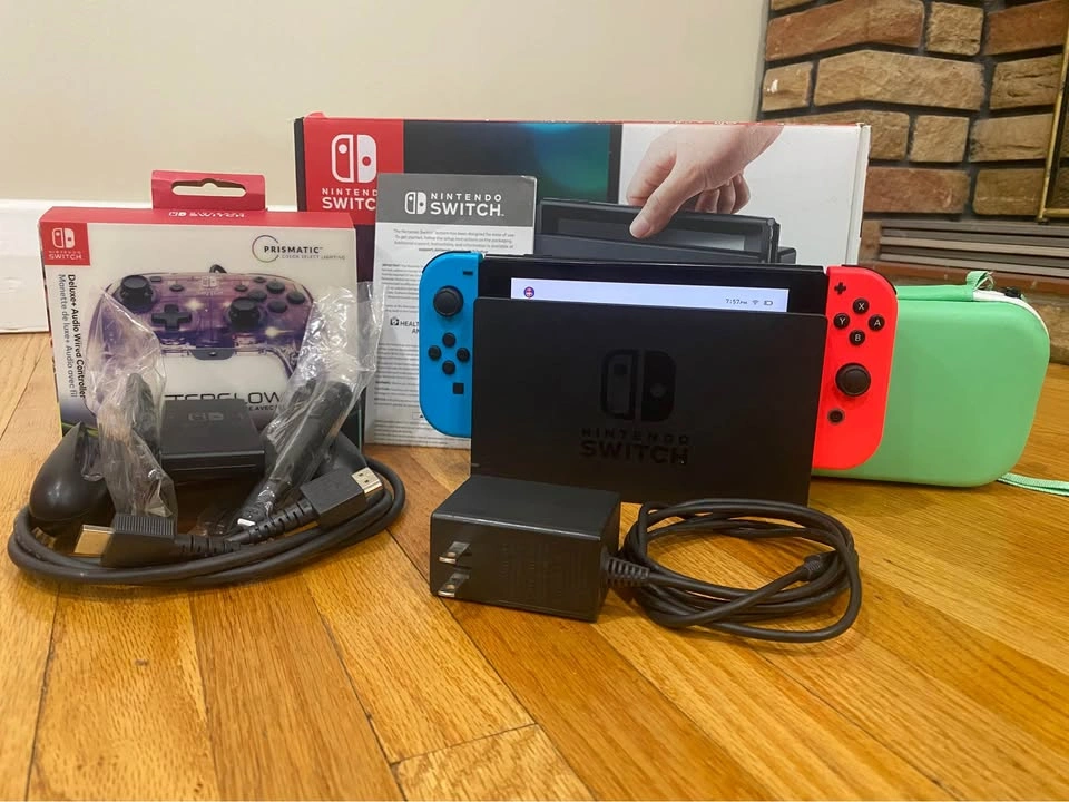 NINTENDO SWITCH BUNDLE + EXTRA CONTROLLER - photo 2