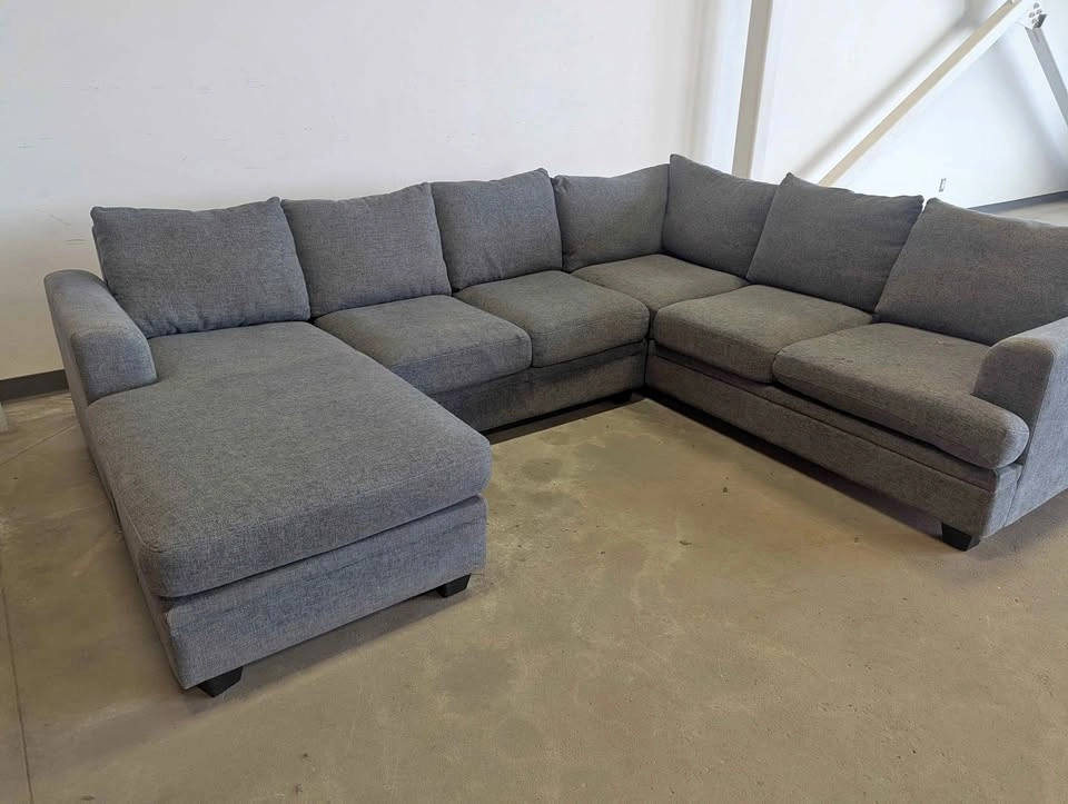 Large reversible sectional. Delivery available