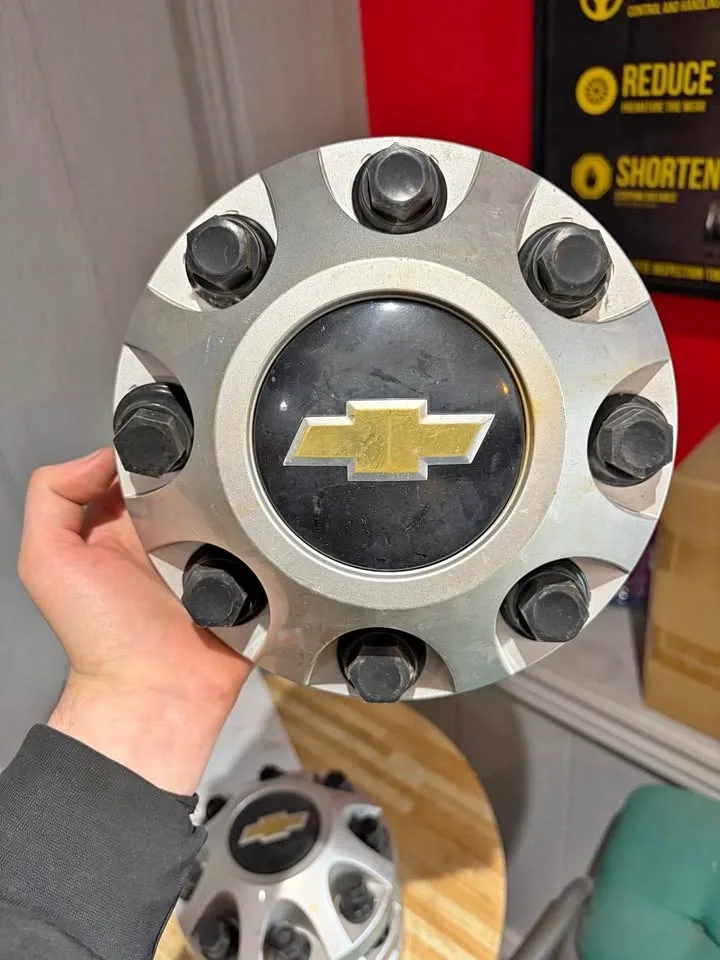 4 Silver GM OEM 8-Lug Hubcaps