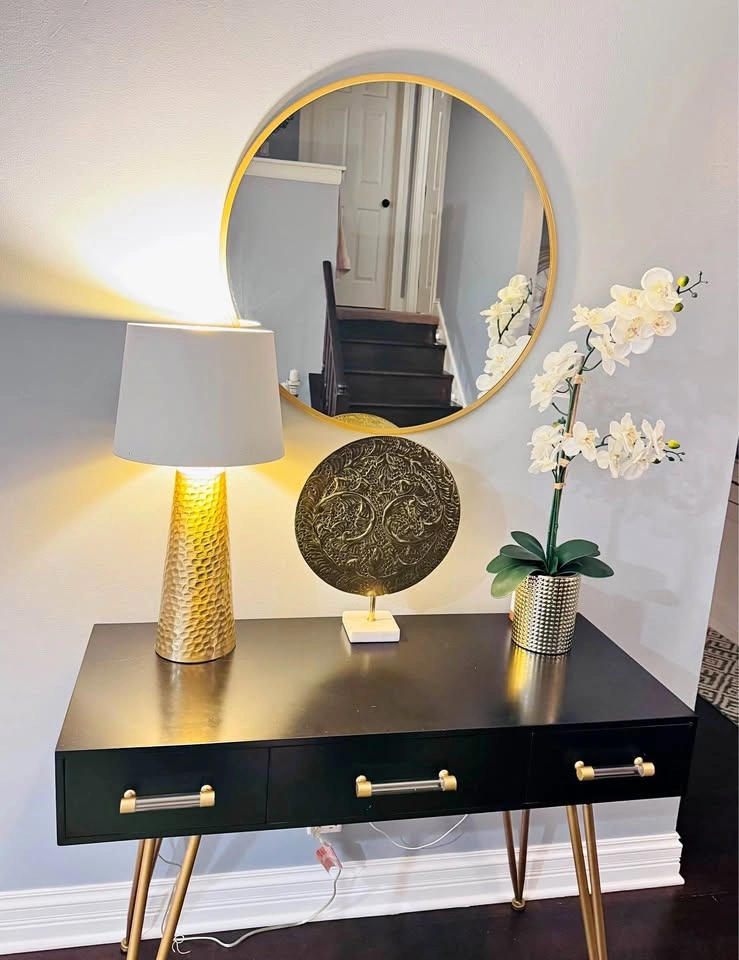 Console table, Gold mirror, table lamp and decor. For prices rea