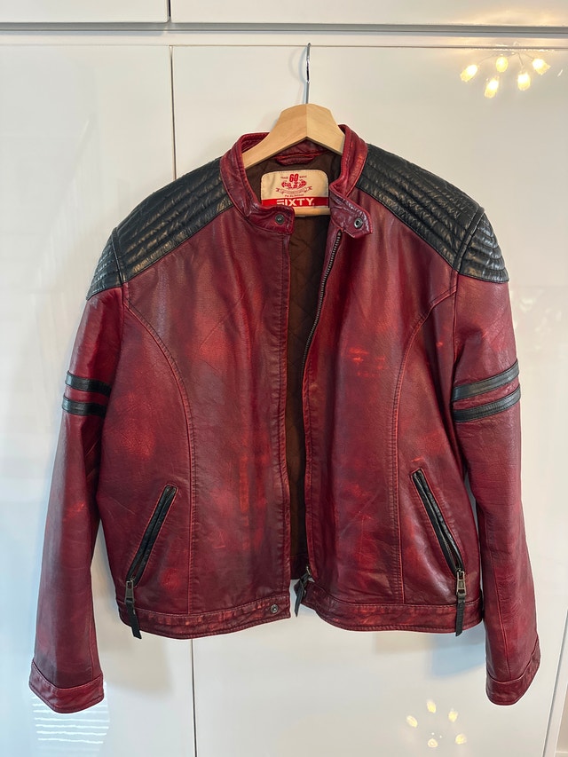 SIXTY "Moderated Costume Helps" leather biker jacket.