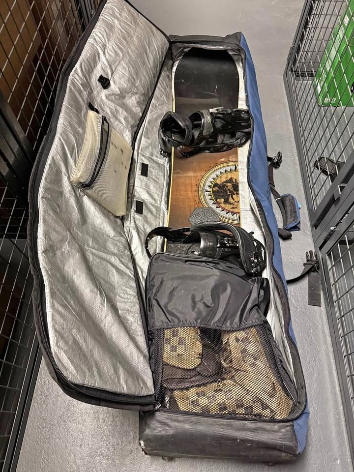 Burton snowboard, bindings and boots w/bags