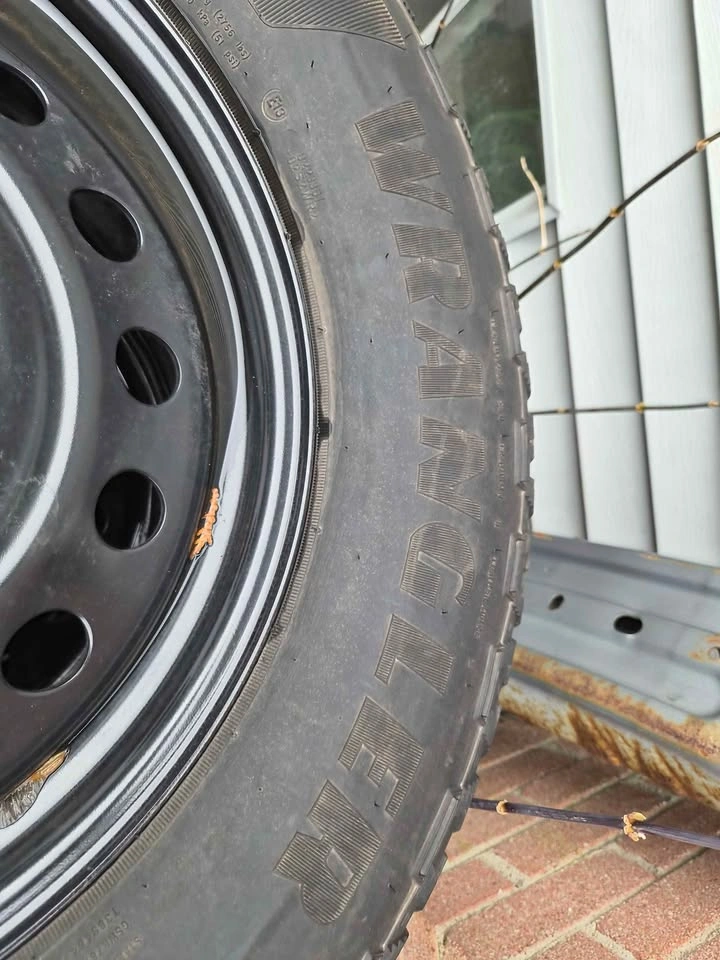 Goodyear Territory AT Tire on Black Steel Rim - 235/65R18 - photo 3