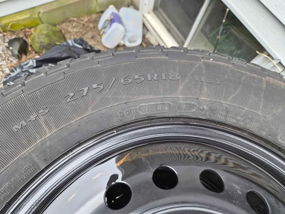 Goodyear Territory AT Tire on Black Steel Rim - 235/65R18 - photo 4