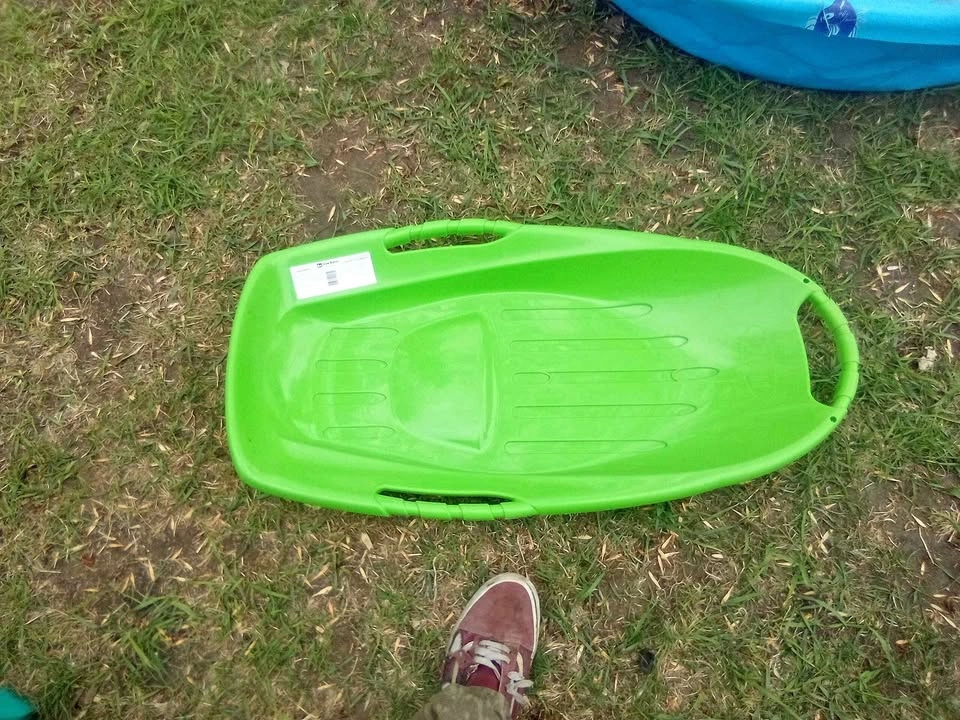 Green Plastic Snow Sled