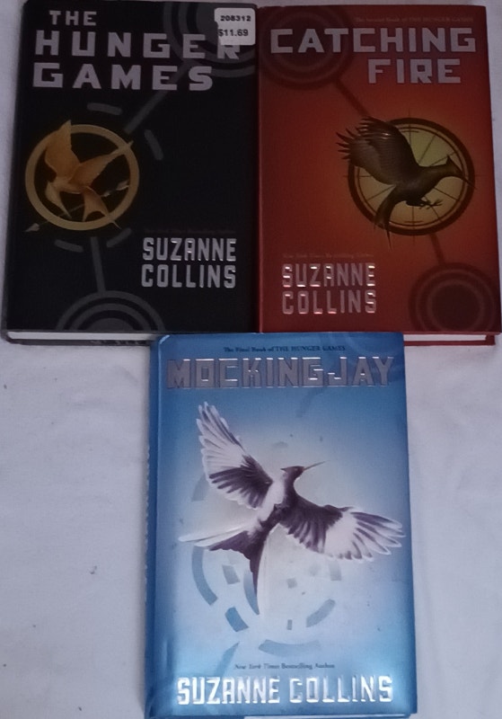 Hunger Games, Catching Fire, Mocking Bird Trilogy HardCover Book