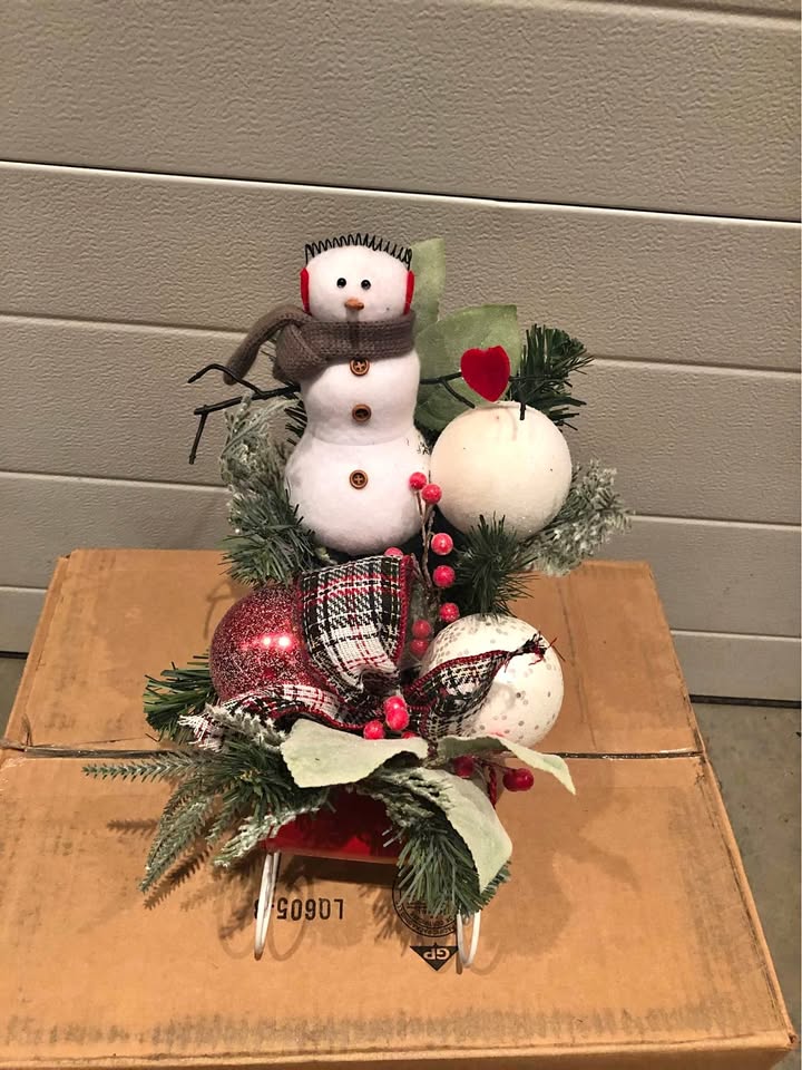 Christmas Designer Floral arrangement snowman in sleigh