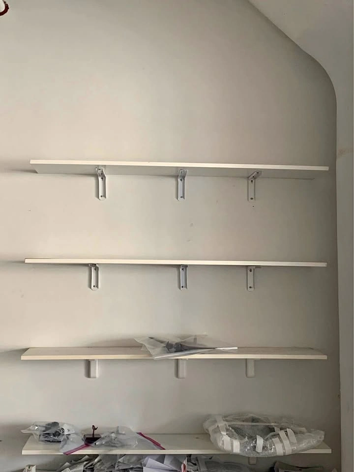 White shelf with 3 brackets