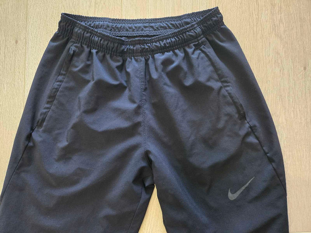 NIKE pants Youth size S. Black