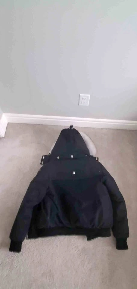 Moose Knuckles black winter jacket with fur hood