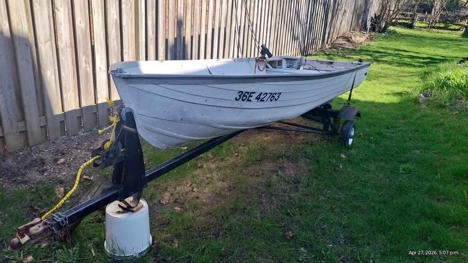14ft Boat, 1994 Johnson 15 HP Motor, and Trailer