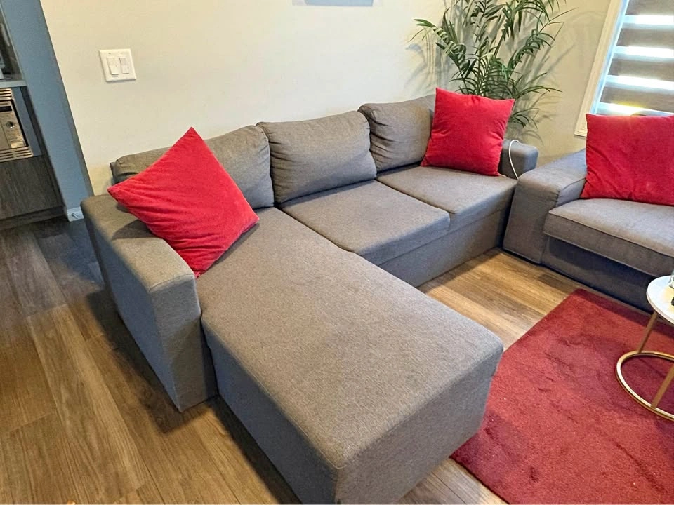 Grey sectional sleeper sofa with storage chaise