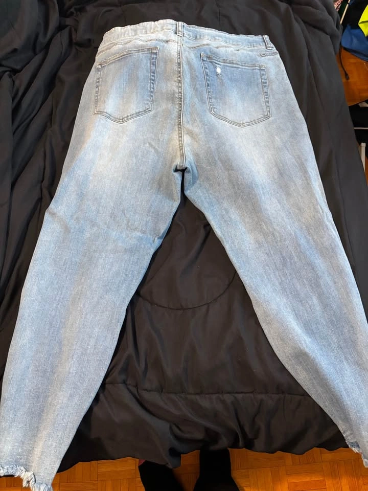 ripped blue jeans - photo 2