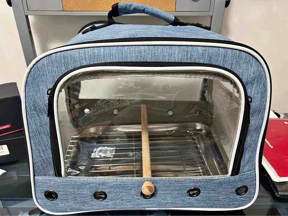 Blue portable bird travel carrier