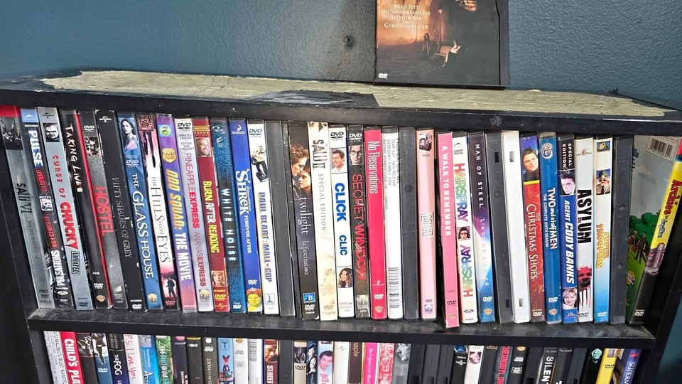 DVDs for sale $2 or $3 each. Or $100 for all