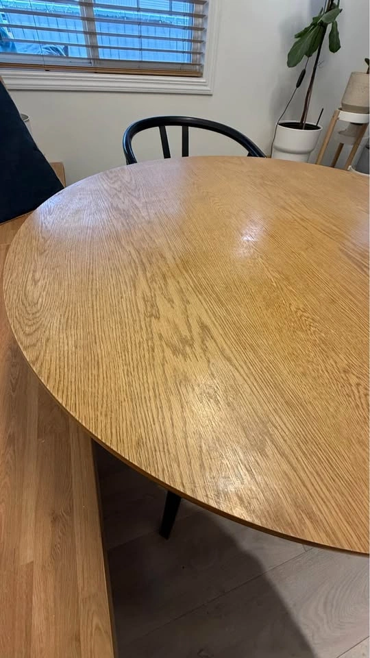 Round wood dining table with black legs - photo 5