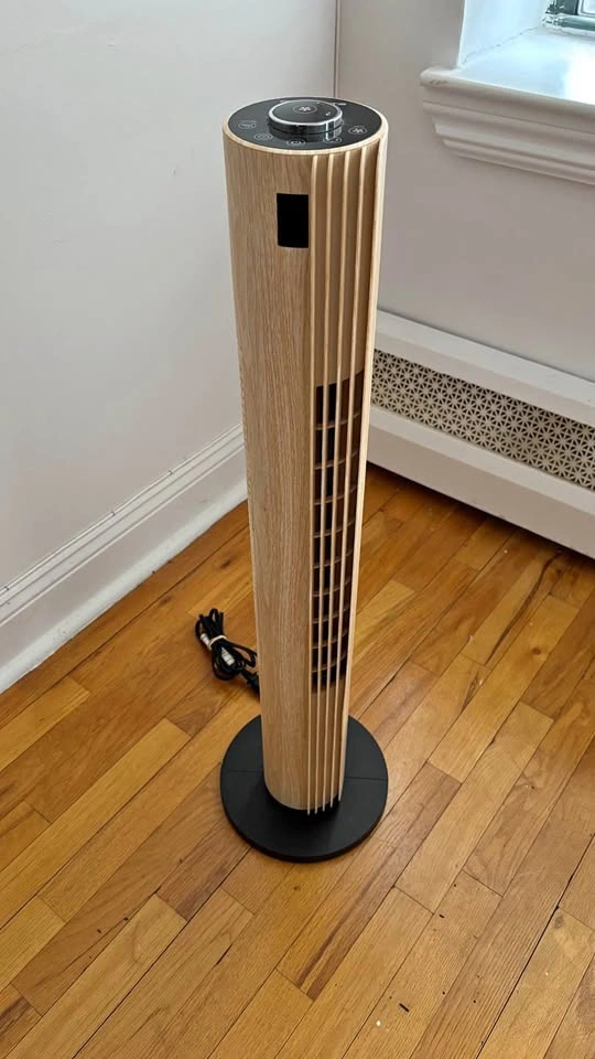 Wood look rotating tower fan
